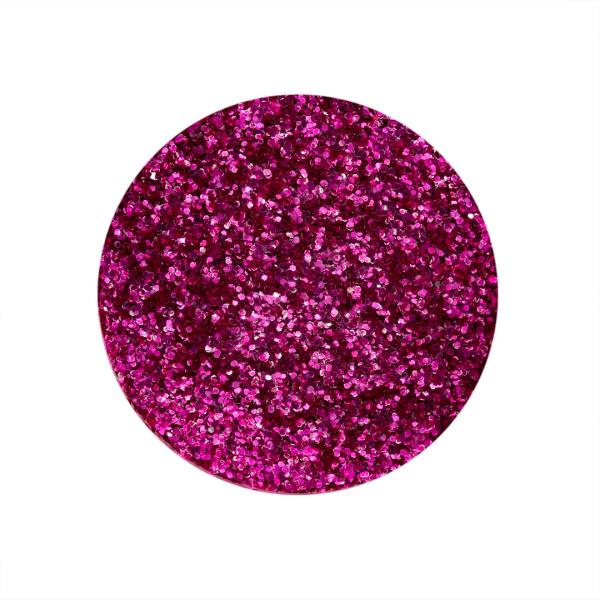 Sehr feiner, intensiver Bio-Glitter in leuchtendem Pink, der dicht aufgetragen einen strahlenden, funkelnden Effekt für Kerzendekorationen bietet.